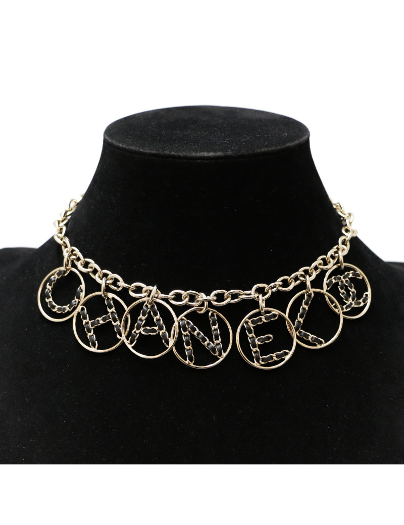 CHANEL light gold necklace spelling C H A N E L