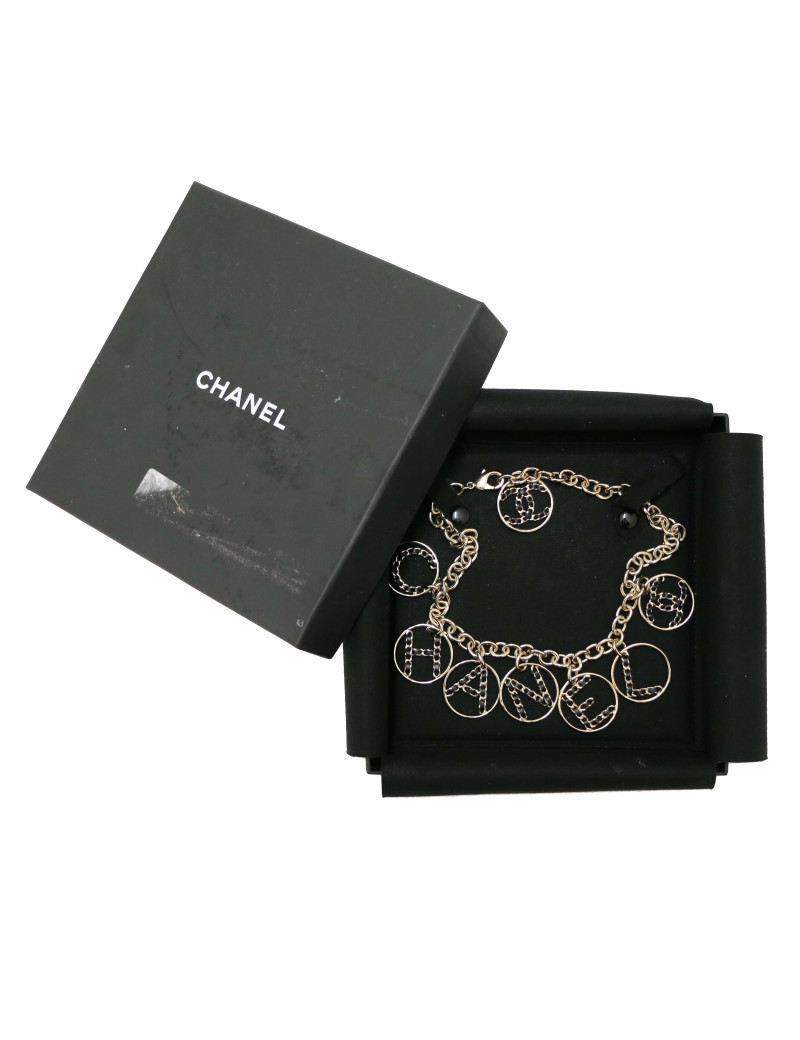 CHANEL light gold necklace spelling C H A N E L