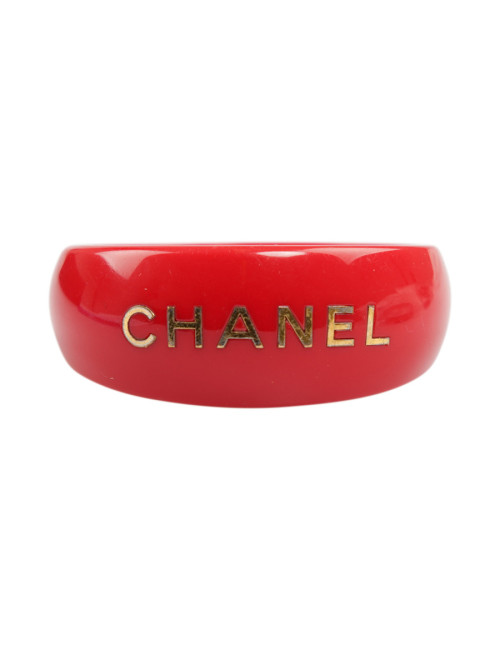 CHANEL red resin and gold inscription bracelet