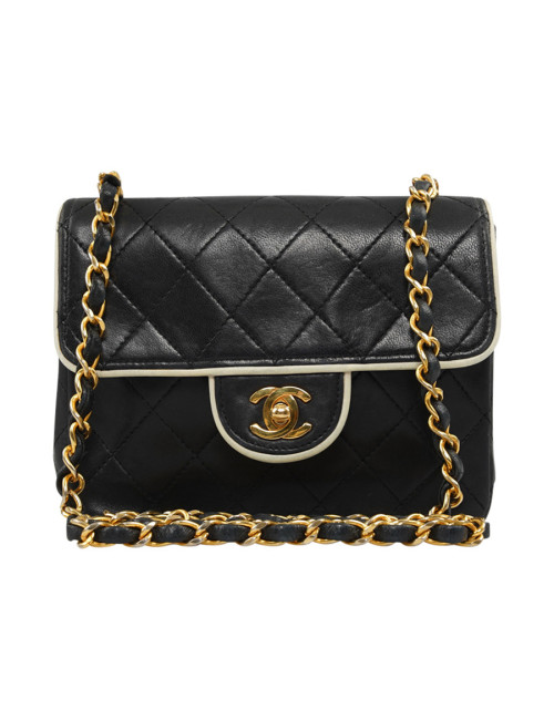 Petit sac vintage CHANEL noir gansé de blanc