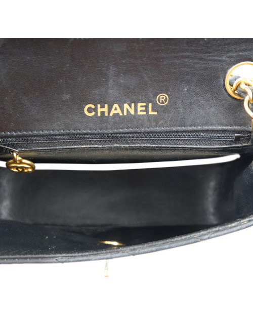 Petit sac vintage CHANEL noir gansé de blanc