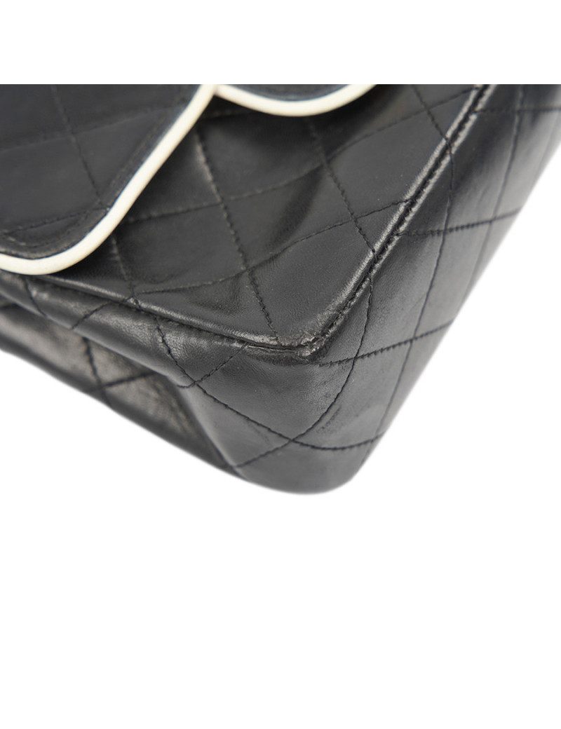 Petit sac vintage CHANEL noir gansé de blanc