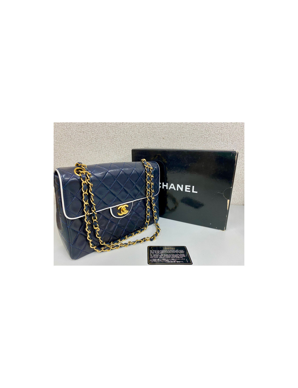 Sac vintage CHANEL noir et blanc