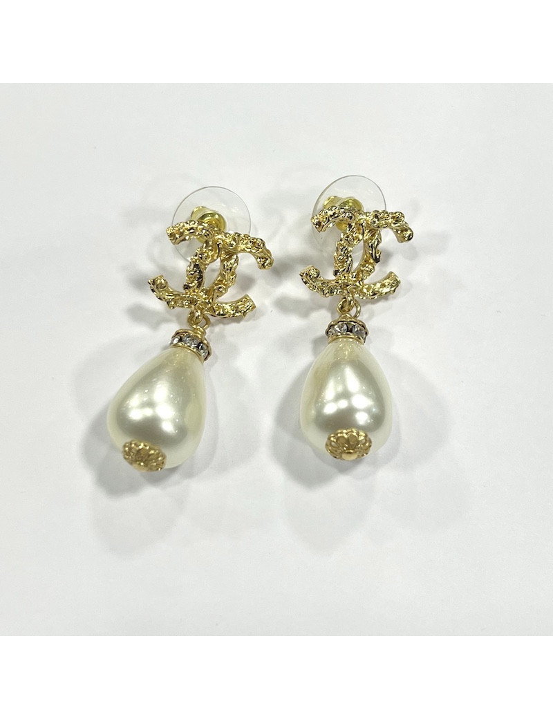 Clous d'oreilles CHANEL pendants dorés