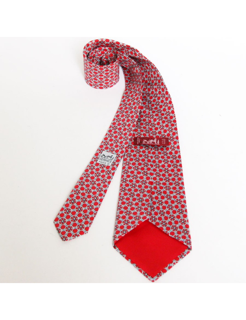 Cravate HERMES en soie rouge motifs ovales