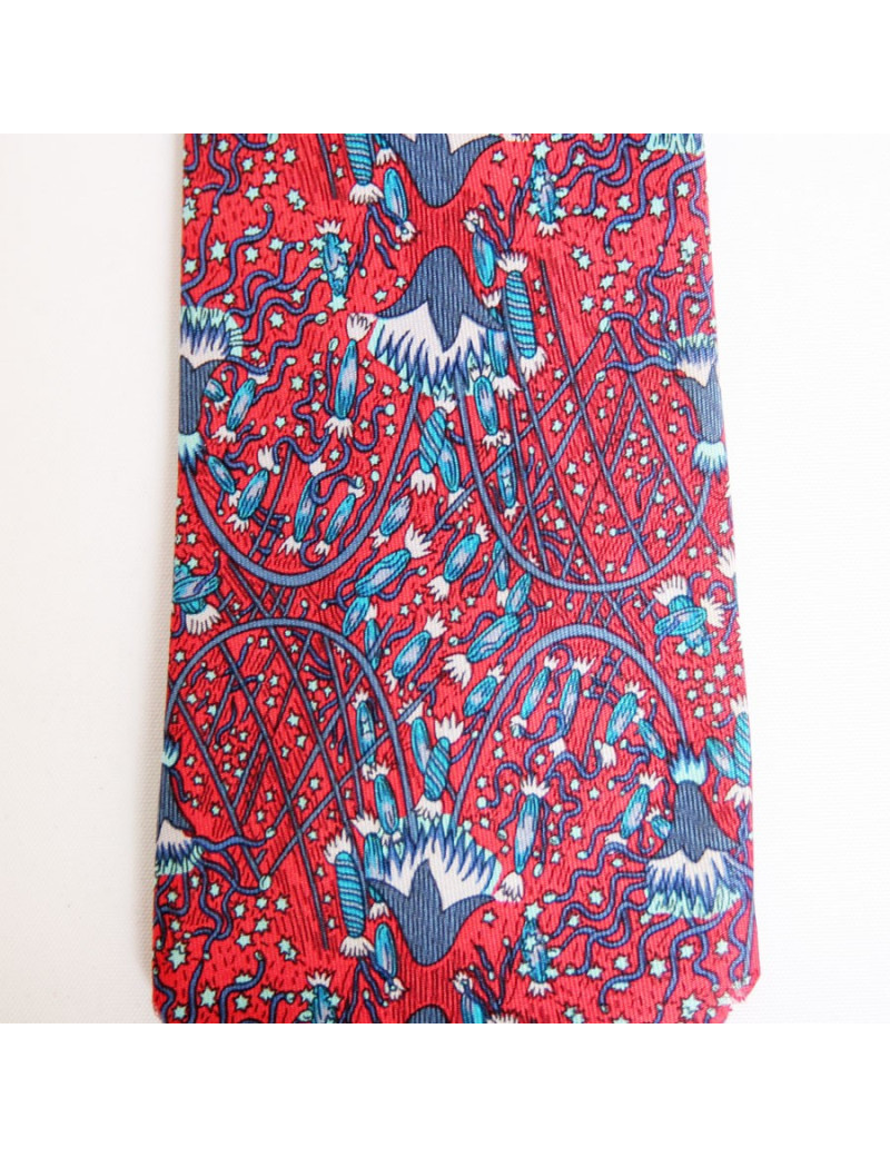 Cravate HERMES en soie rouge motifs fleurs