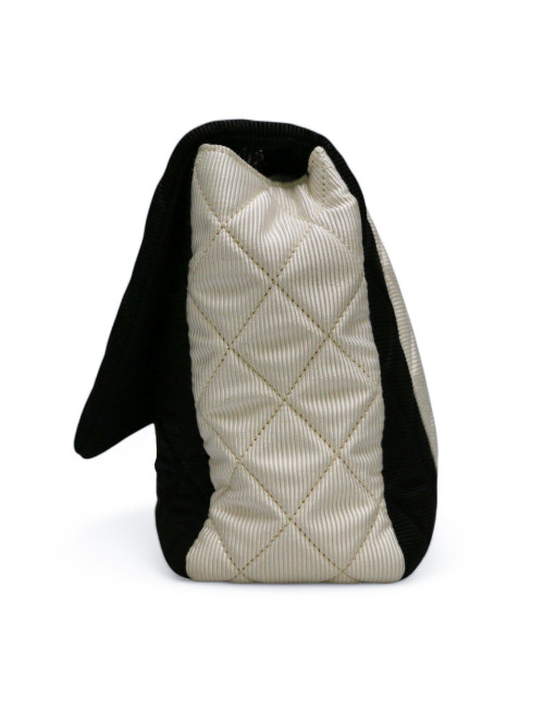 Sac classique 2.55 Chanel noir et blanc, nous livrons dans le monde