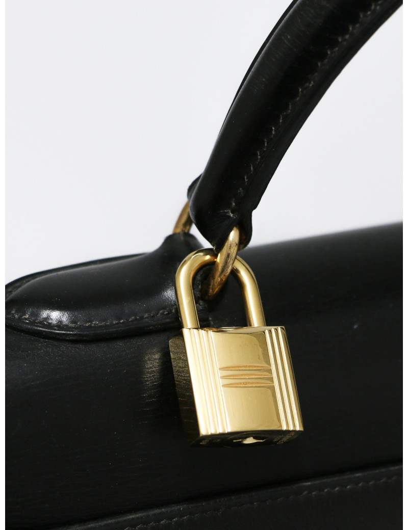 Sac sellier Kelly box 35 Hermès vintage disponible en seconde main de luxe