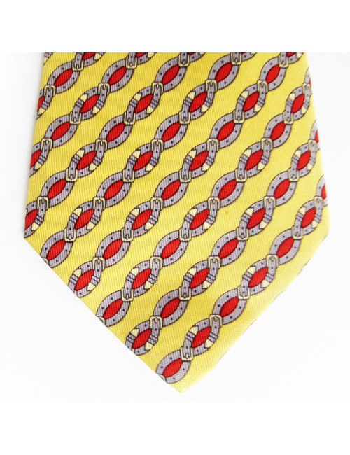 Cravate HERMES en soie jaune motifs ceintures