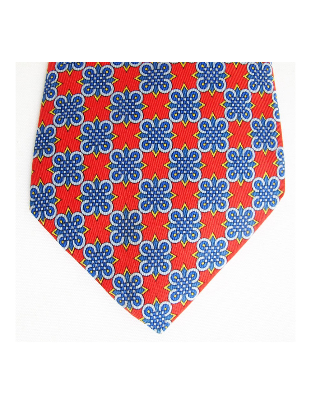 Cravate HERMES en soie rouge motifs graphiques