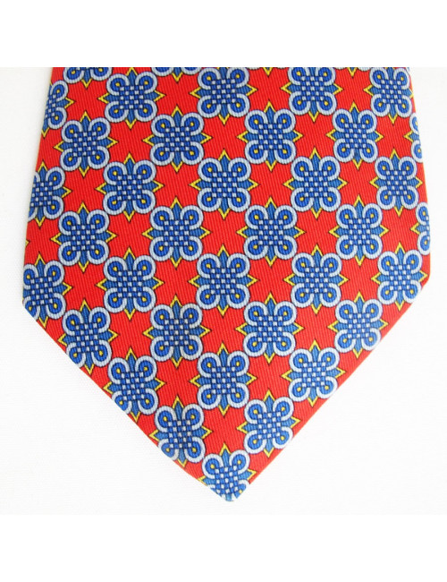 Cravate HERMES en soie rouge motifs graphiques