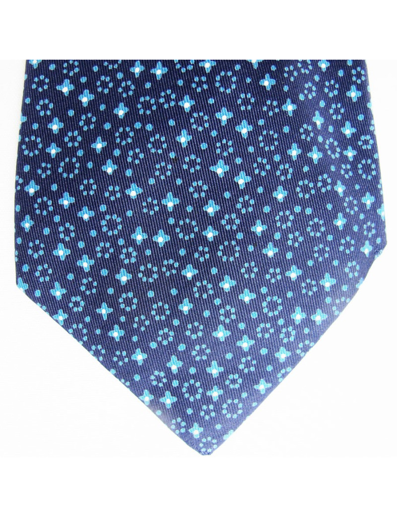 Cravate HERMES en soie bleu motifs étoiles