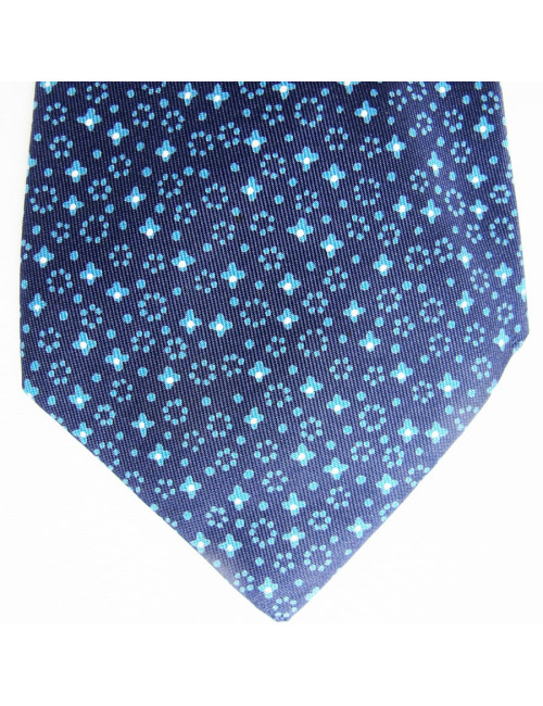 Cravate HERMES en soie bleu motifs étoiles
