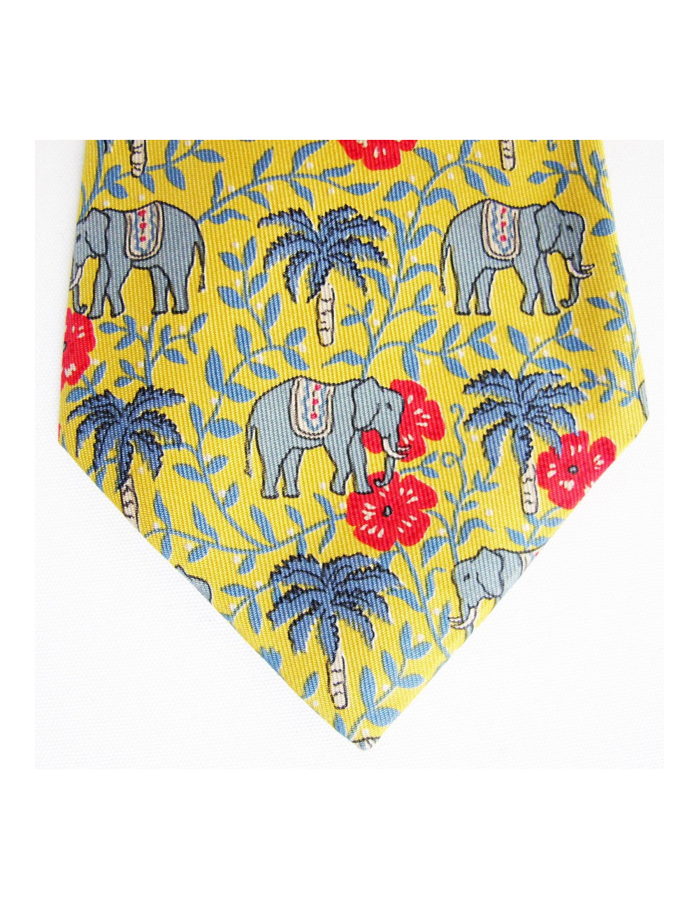 Cravate HERMES en soie jaune motifs éléphants