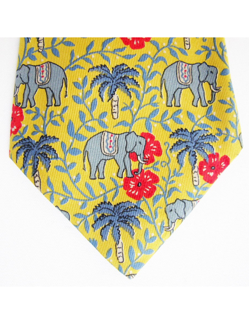 Cravate HERMES en soie jaune motifs éléphants