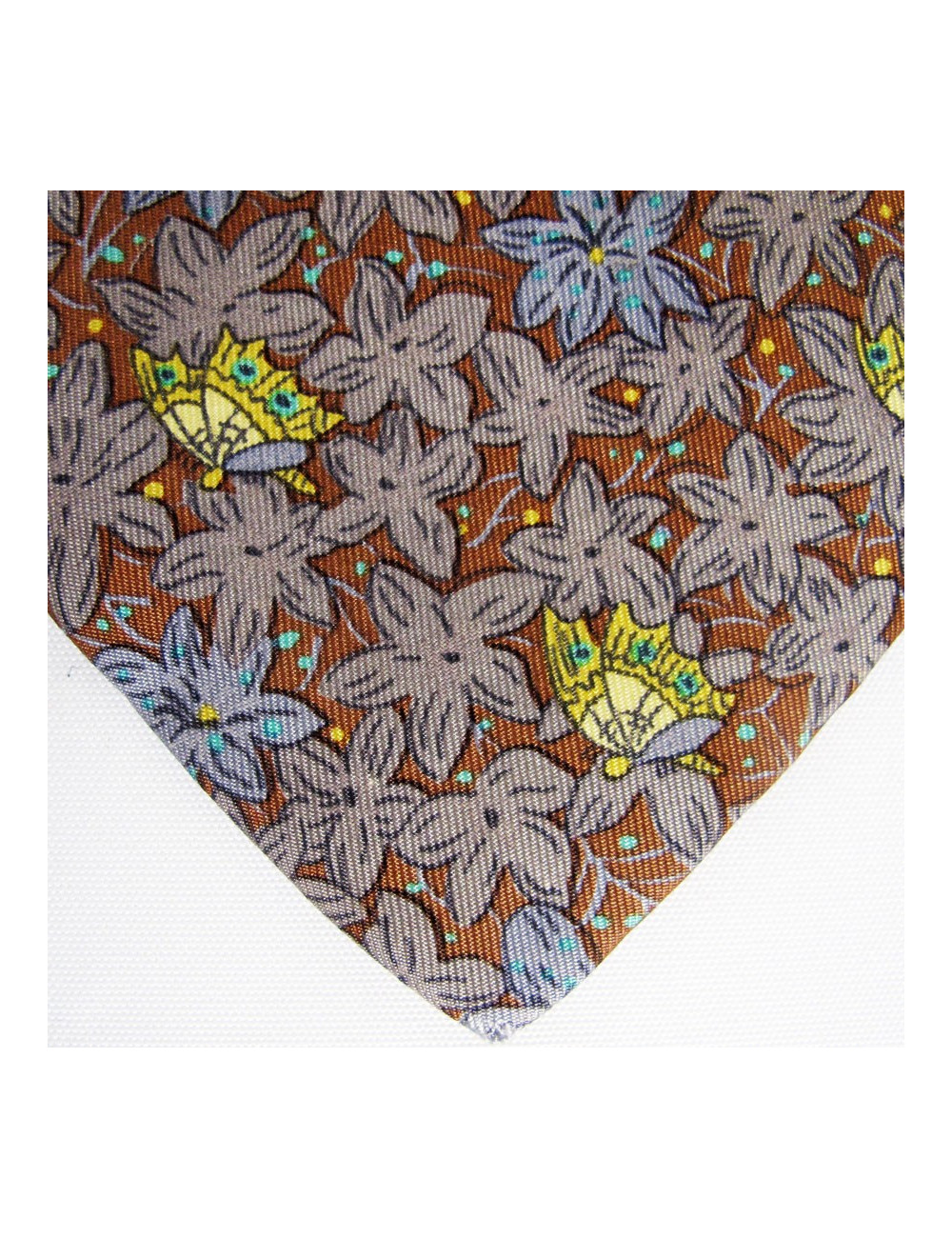 Cravate marron HERMES avec imprimés floraux et paillons