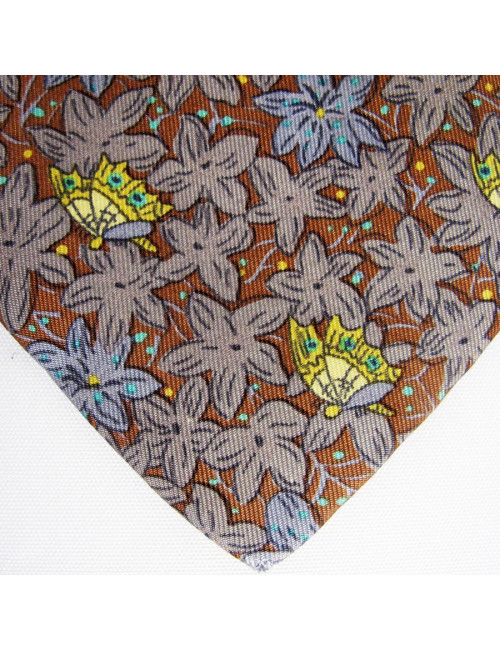 Cravate marron HERMES avec imprimés floraux et paillons