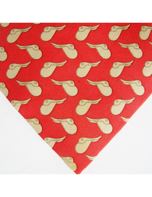 Cravate HERMES rouge en soie motifs selles