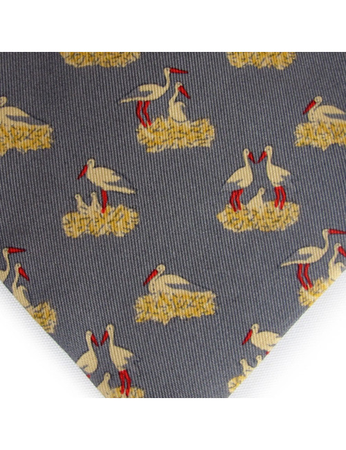Cravate HERMES en soie motifs couple pelicans