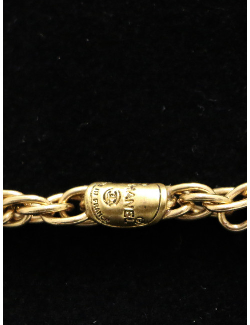 Long sautoir vintage CHANEL pièces CC et pâte de verre rubis et emeurode