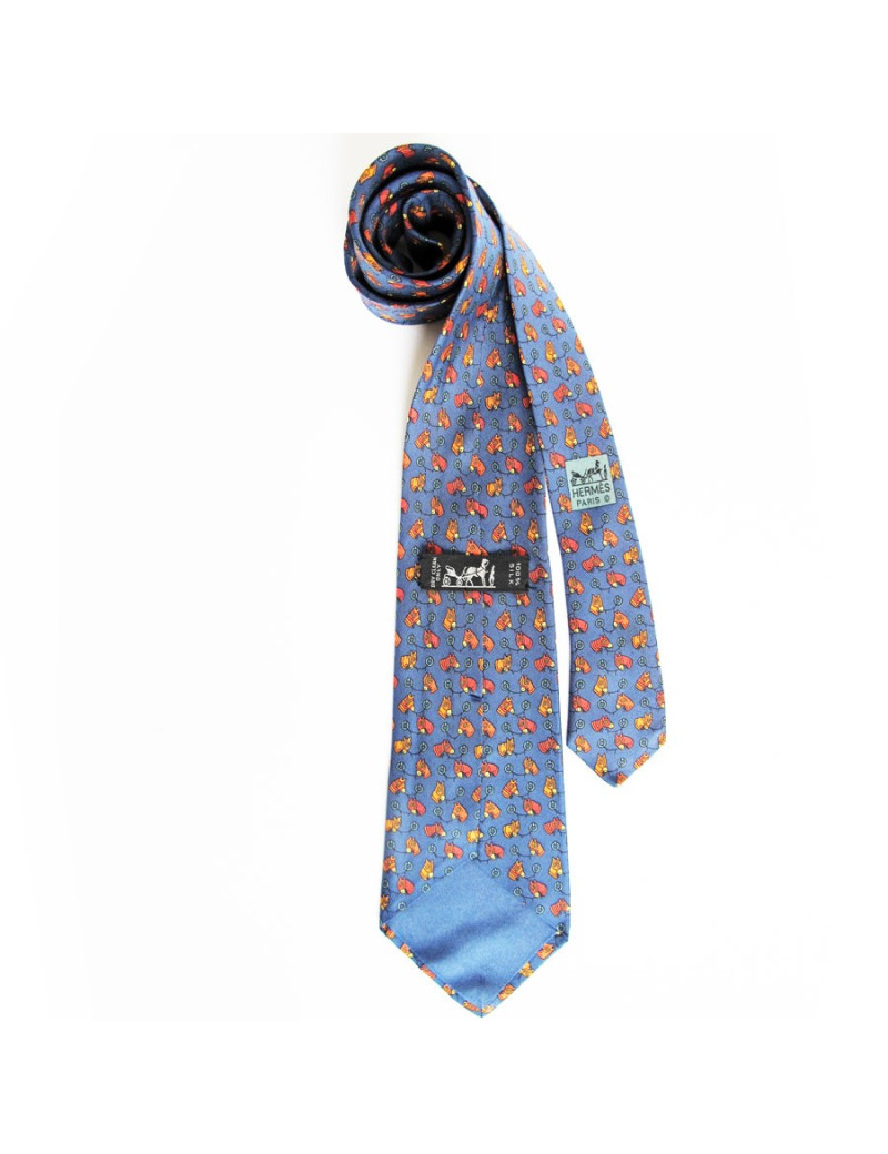 Cravate HERMES en soie bleu motifs chevaux