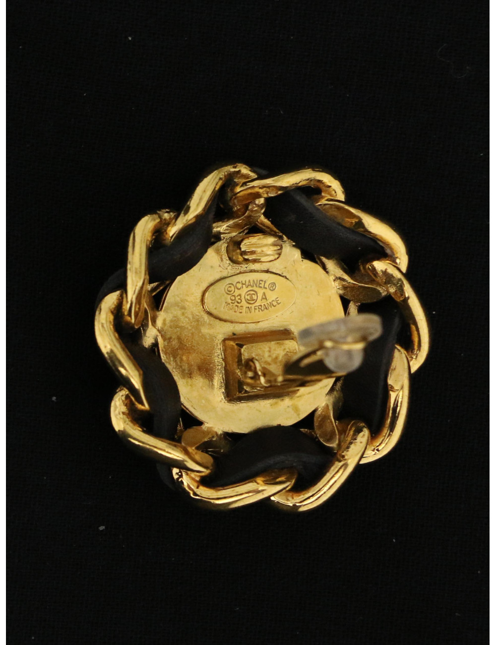 Boucles d'oreille Chanel tressées et dorées