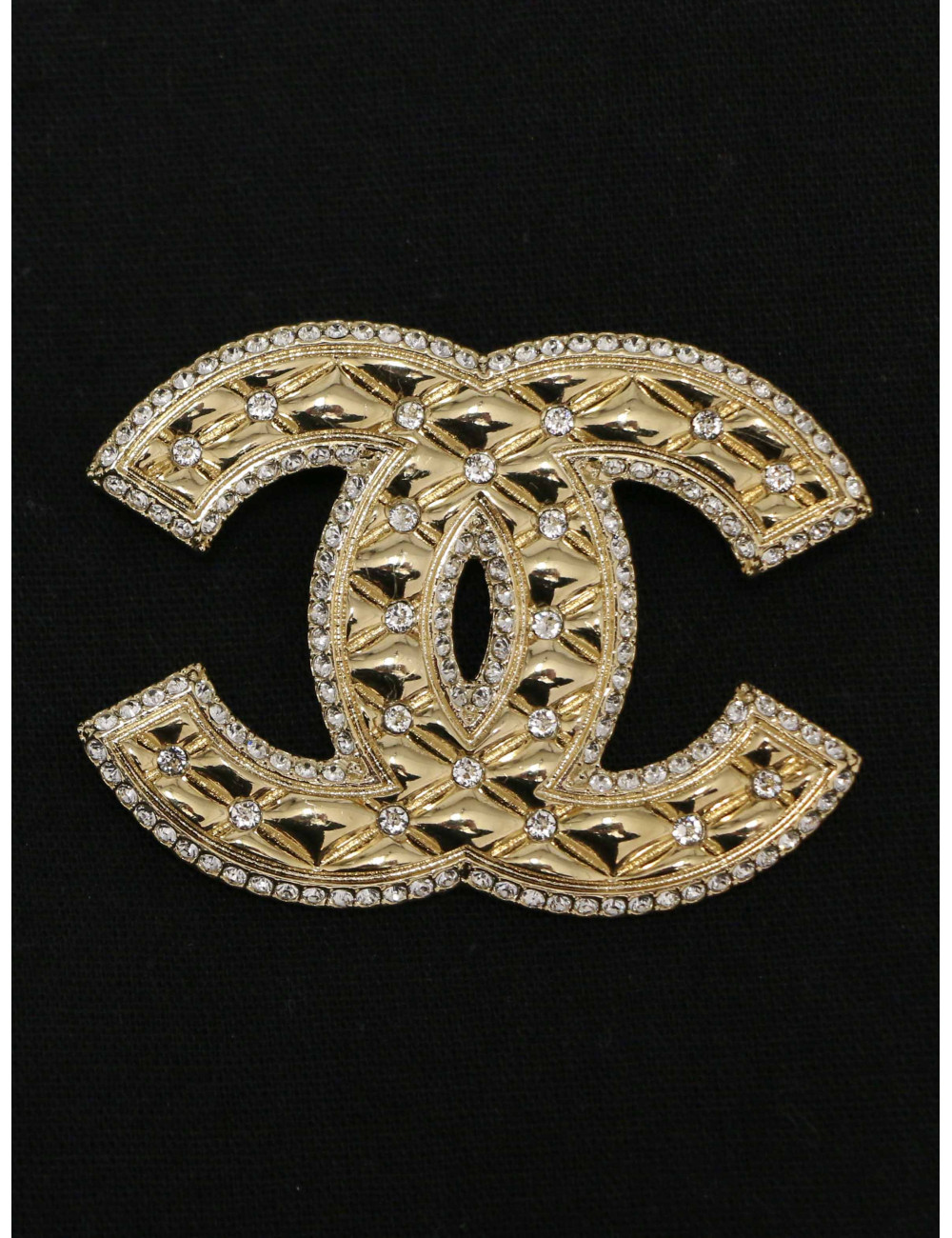 Broche Chanel dorée matelassé