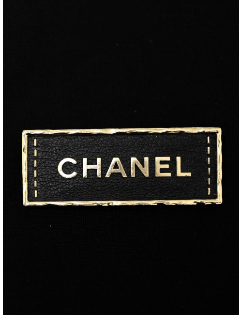 Broche plaque Chanel or et noir
