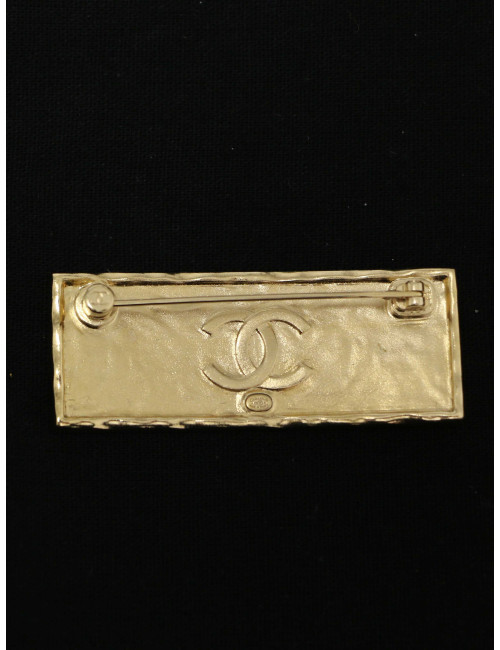 Broche plaque Chanel or et noir