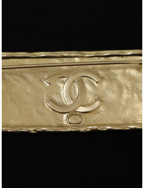 Broche plaque Chanel or et noir