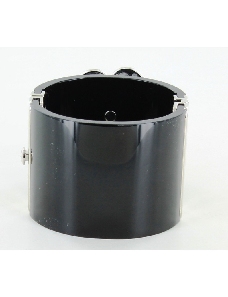 manchette CHANEL noire et camélia en brillants