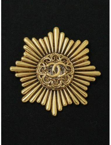 Broche Chanel starbust dorée vintage 1983 2