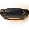 Timeless CHANEL black lamb leather and gold chain bag