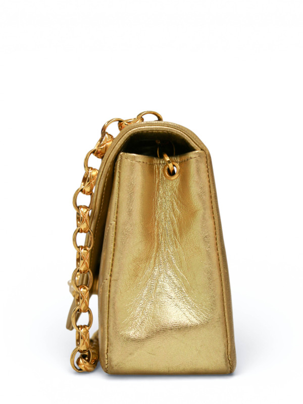 Sac du soir Chanel cuir doré chevrons