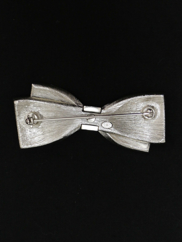 Broche Chanel noeud argent
