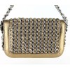 Small CHANEL flap bag in Bronze gilded leather