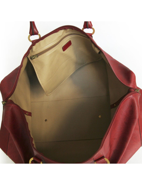 Sac de voyage DIOR en toile embossée rouge