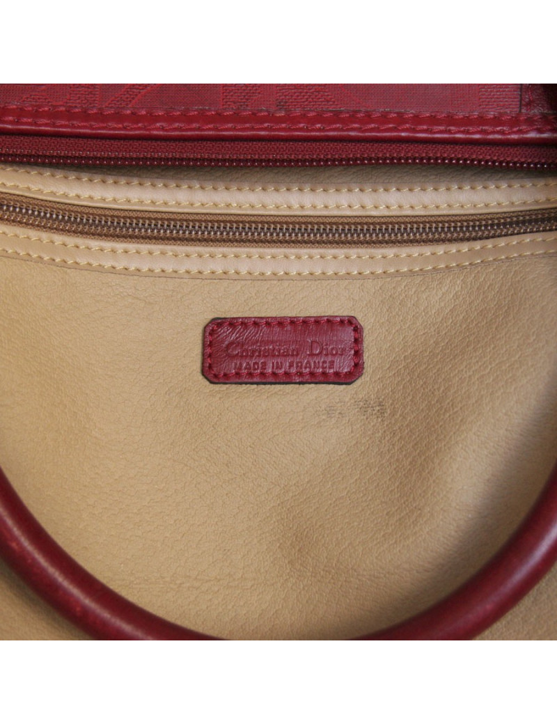 Sac de voyage DIOR en toile embossée rouge