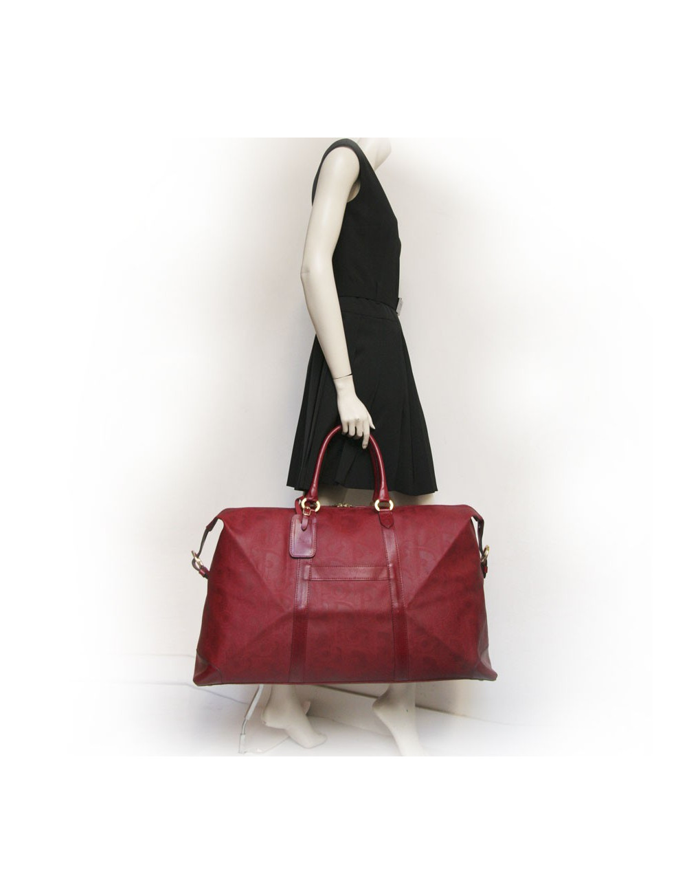 Sac de voyage DIOR en toile embossée rouge