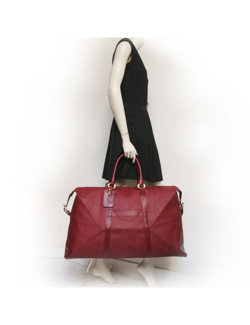 Sac de voyage DIOR en toile embossée rouge