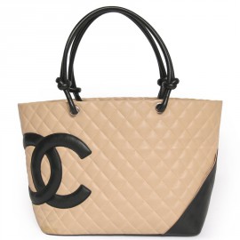 Shopping Cambon CHANEL two-tone beige and black bag GM