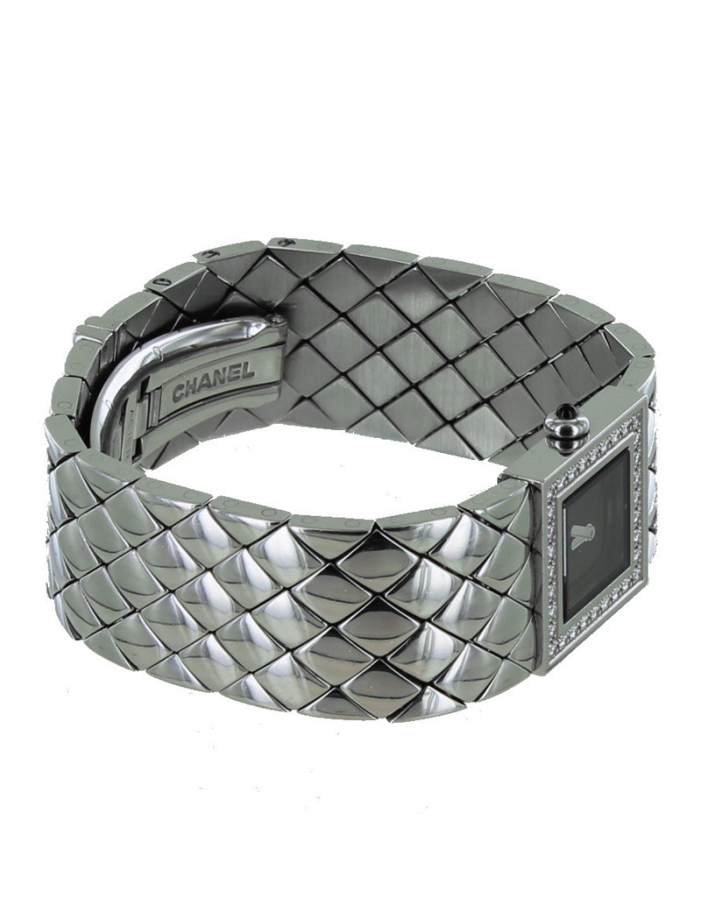 Montre matelassée CHANEL acier et brillants