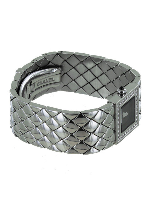 Montre matelassée CHANEL acier et brillants
