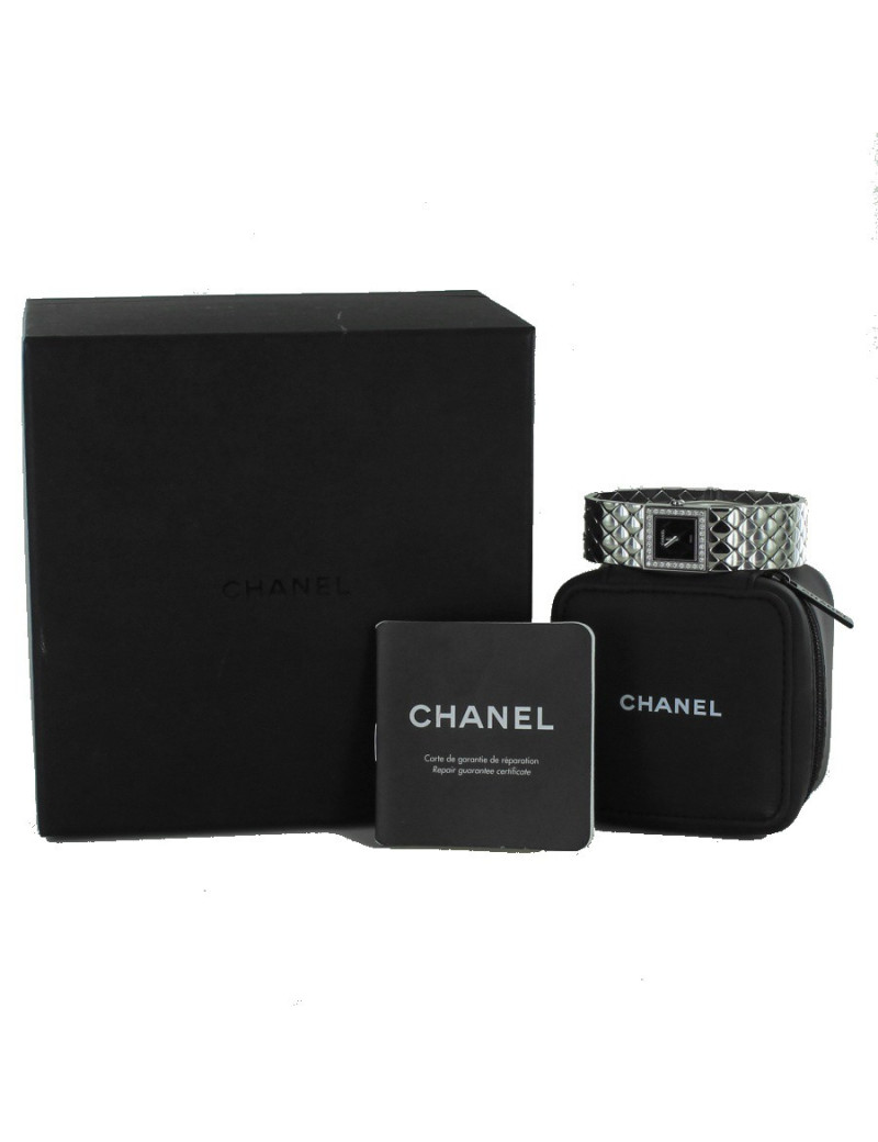Montre matelassée CHANEL acier et brillants