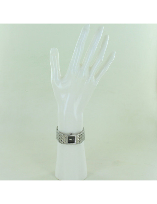 Montre matelassée CHANEL acier et brillants