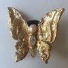  YVES SAINT LAURENT butterflies clip-on earrings in gilded metal
