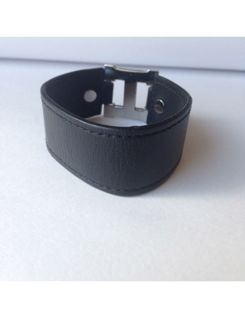 Bracelet HERMES cuir noir et "H" palladié