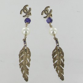 CHANEL feather earrings