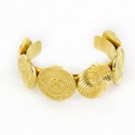 CHANEL bracelet in gilded metal set along with gilded buttons