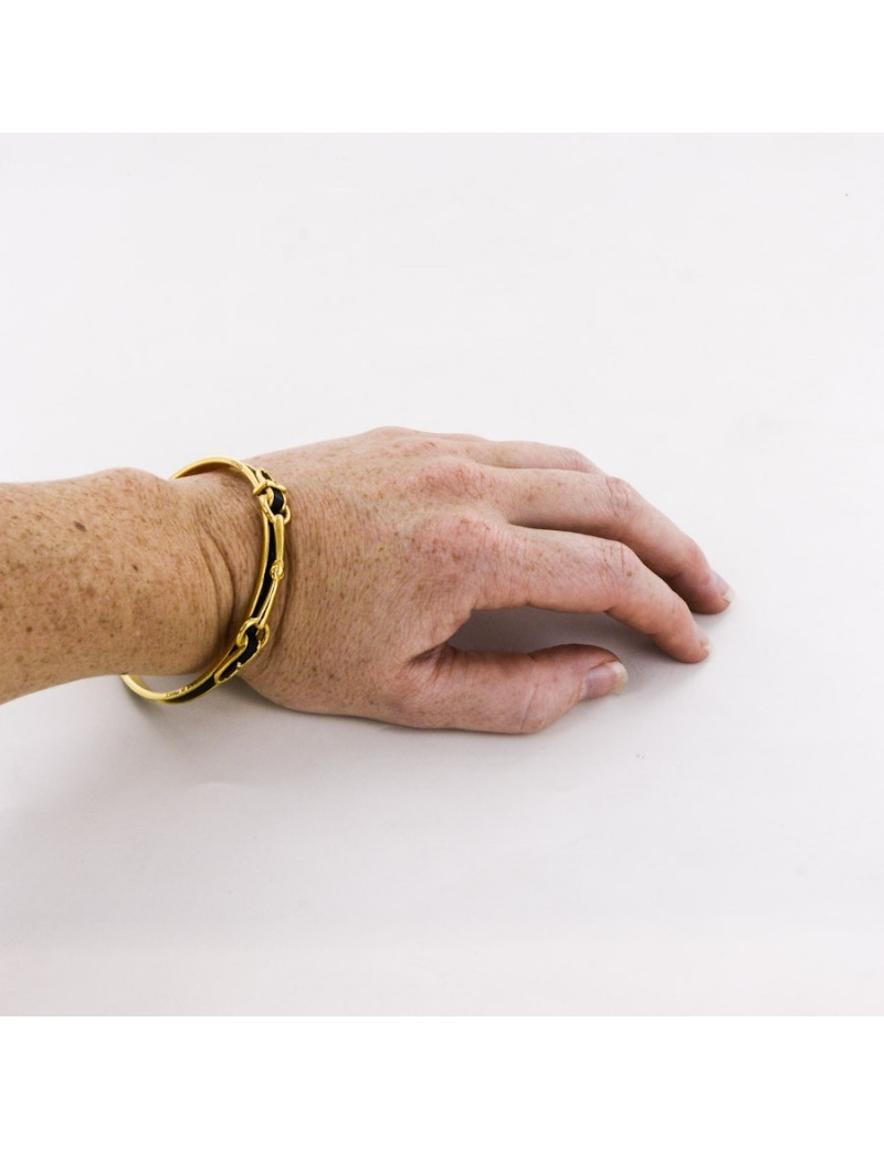 Bracelet HERMES  "mors" plaqué or et lézard noir